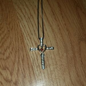 Elegant Silver and Ruby Cross Pendant Necklace